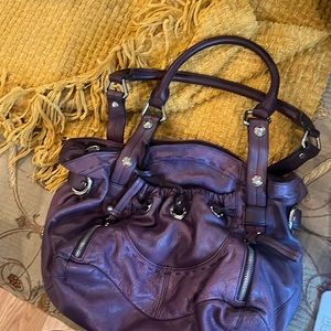 Purple leather purse by Bmakowsky